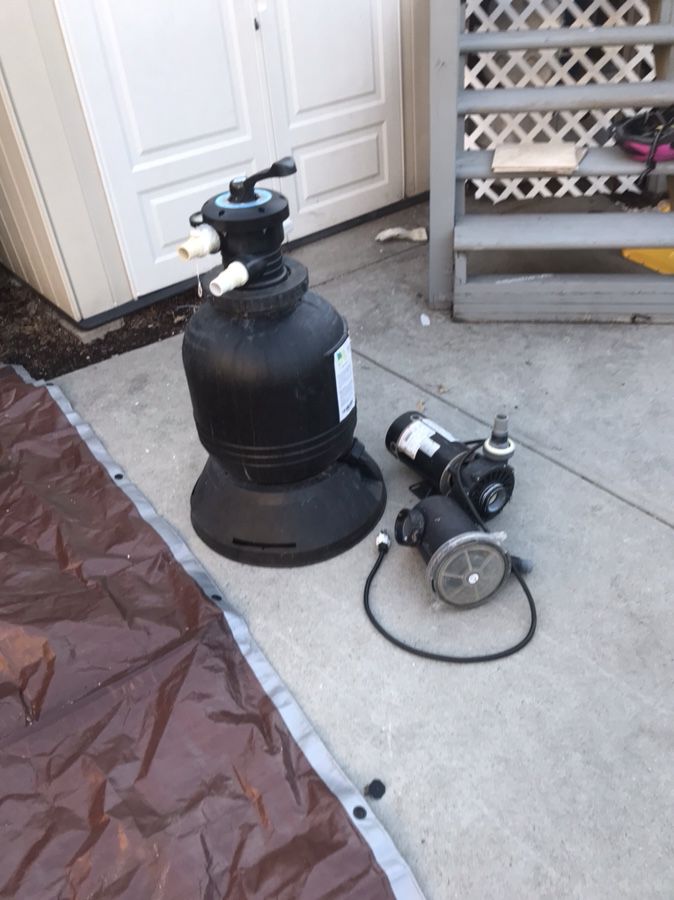 Millennium above ground pool pump and sand filter.