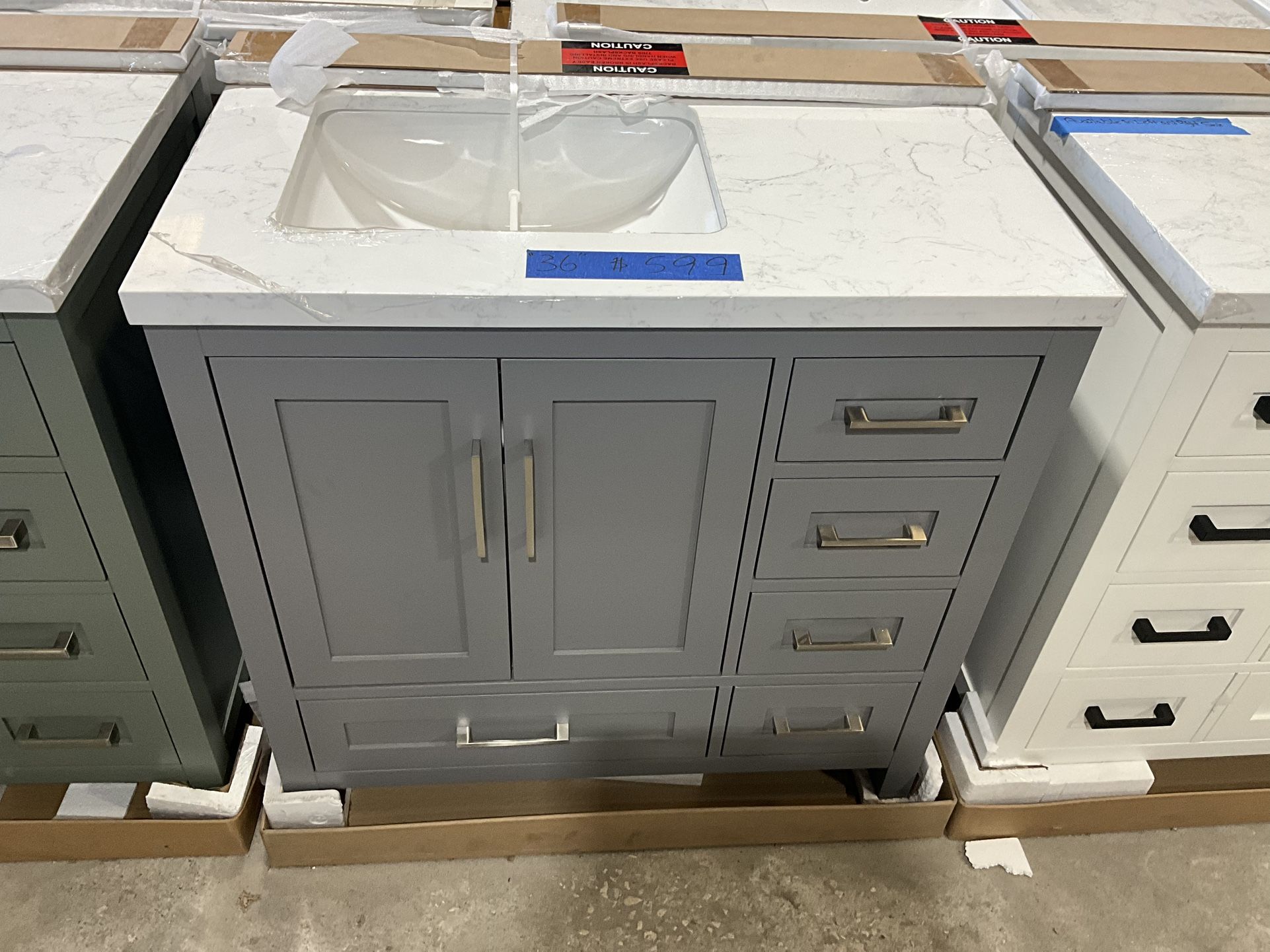 36” Bathroom Vanity in grey , single sink soft close solid wood with vanity top in white  $599  Luke’s liquidations warehouse Address:  2434 N Forsyth