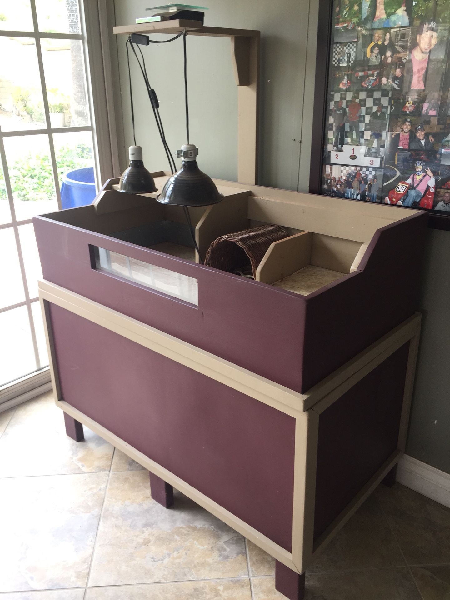 Tortoise table with both UV-A & UV-B lights for housing a small reptile / tortoise. Hand made & painted with side trap door to store all your goodi
