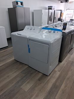 GE BRAND NEW OPEN BOX TOP LOAD WASHER AND GAS DRYER HAS SOME MINOR COSMETIC DEFECTS WARRANTY INCLUDED