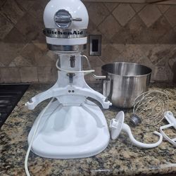 KitchenAid heavy duty with 5 quart bowl and 3 mixing attachments
