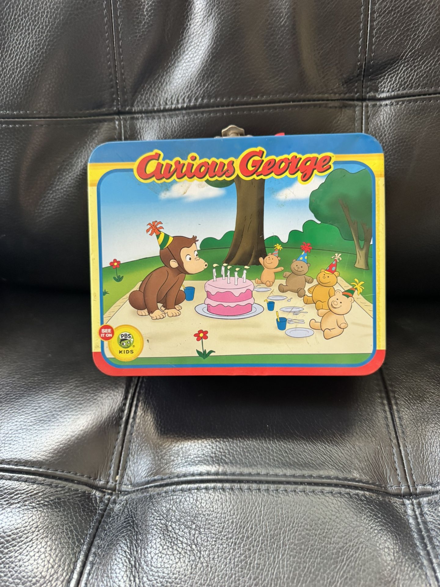 Curious George Tin with Puzzel