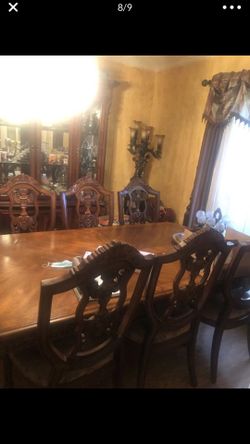 Dining table and China cabinet $1,400