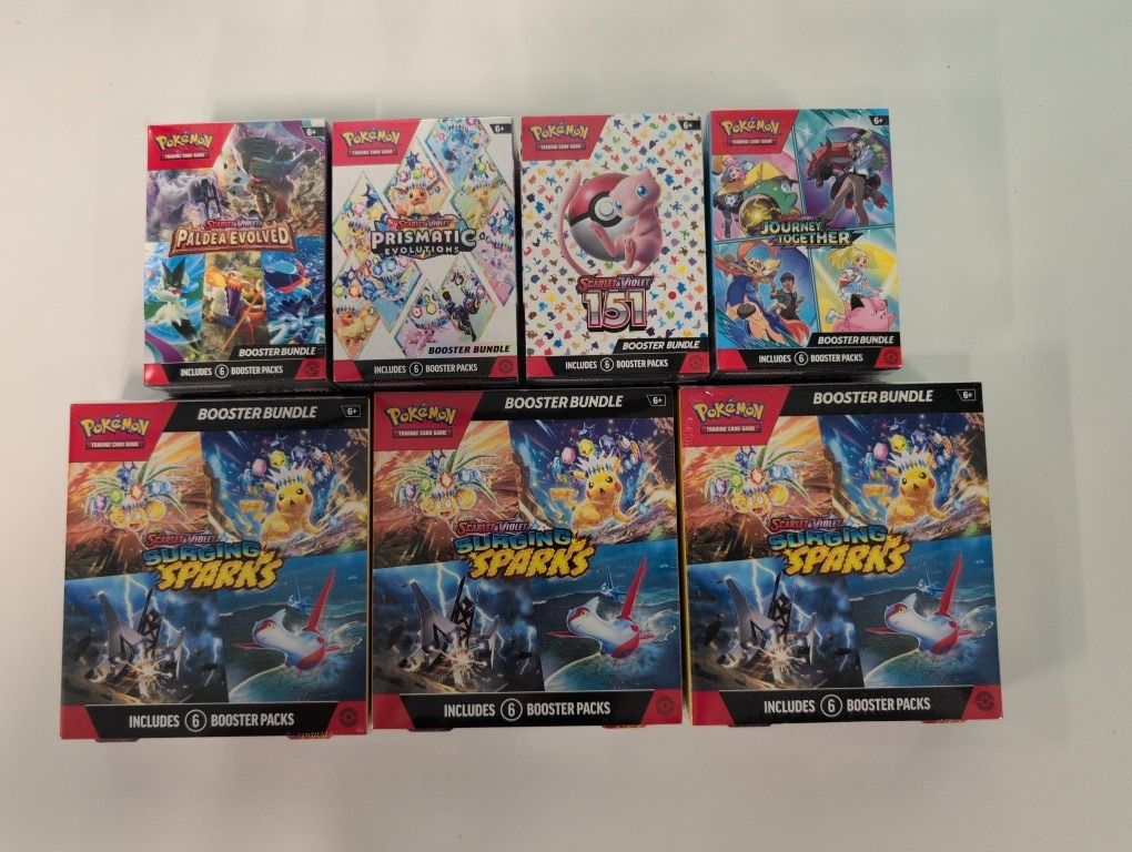 Pokemon Booster Bundle 151 Prismatic Evolution Surging Spark JT Paldea Evolved