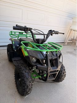 Electric ATV for Kids 36V Four Wheelers with 500W Powerful Motor, Strong Metal Frame,15mph Speed Control, Suspension Kids Quad Bike (Green)