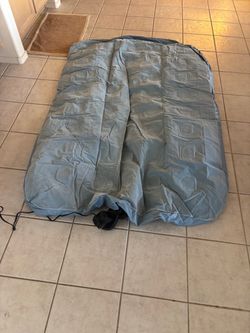 Deflated Air Mattress with Built-In Pump