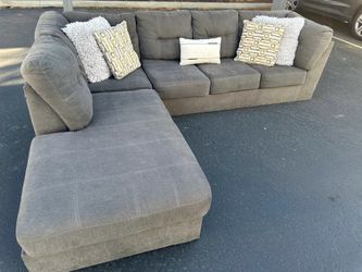 Excellent condition gray living spaces sectional couch !!