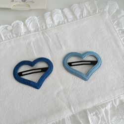 Bundle of 2 heart shaped hair clips
