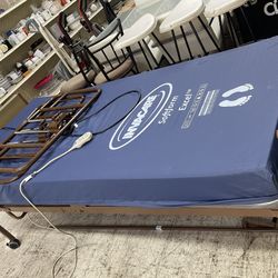 ELECTRIC TWIN SIZE HOSPITAL BED WITH RAILS AND CONTROLS COMPLETE WORKING