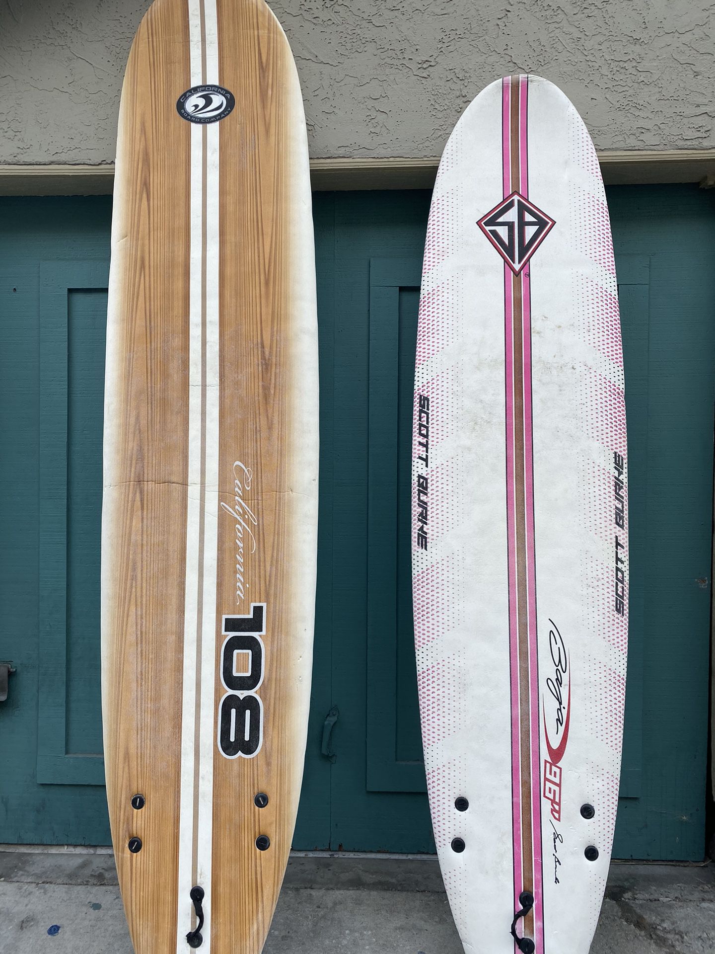 Two foam surfboards