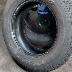 2 Firestone Tires 245/65/17 