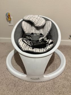 Munchkin baby swing