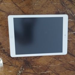 Apple IPad, Silver And White. 9 1/2 X 6 1/2 Inches