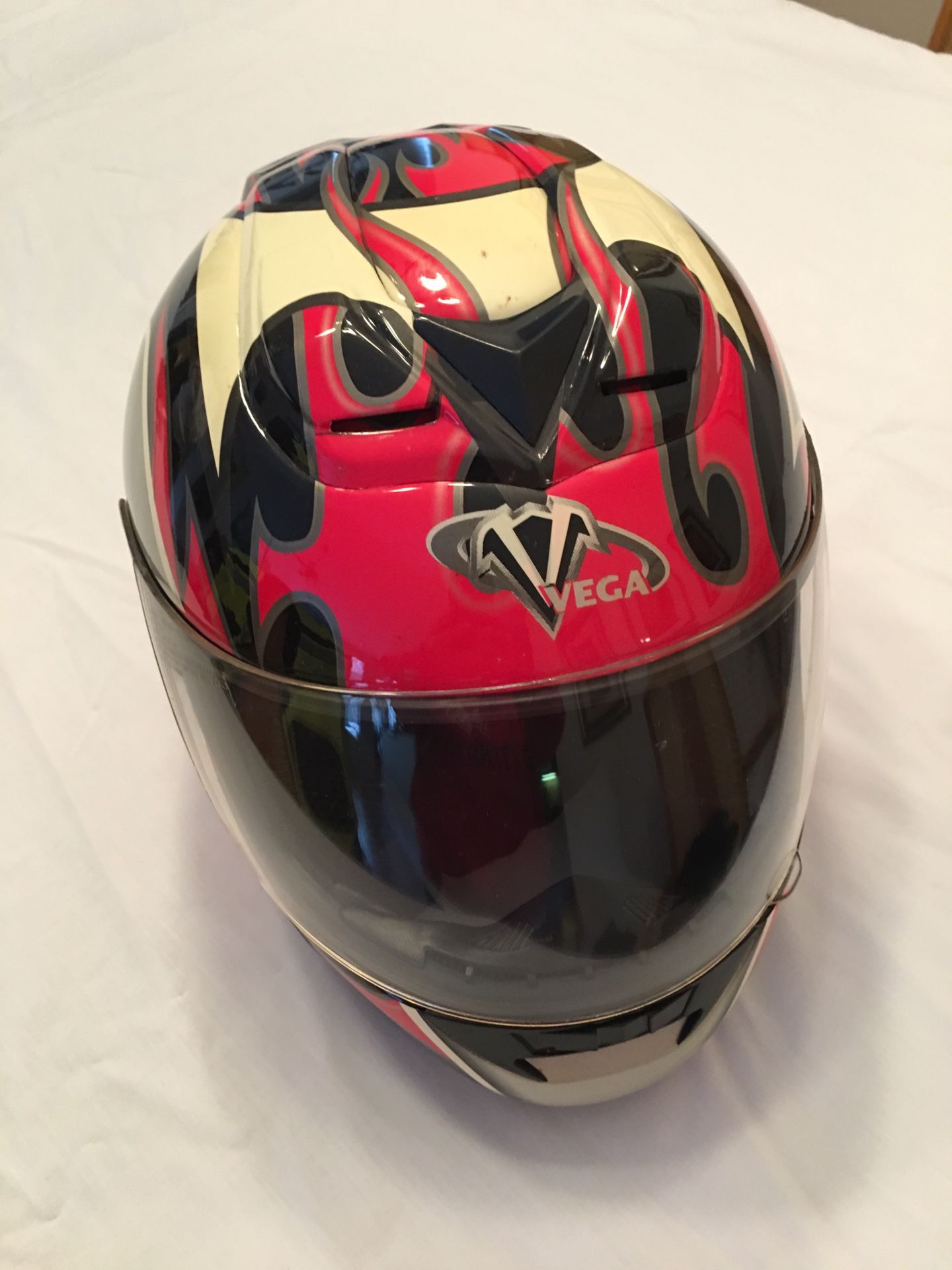 Helmet with face guard and shield.