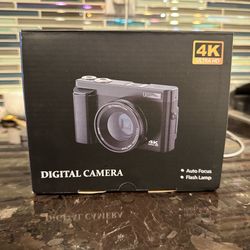 4K Ultra HD digital camera with 16MP, 3.0" LCD screen, and built-in WiFi - comes with charger, adapter, cardreader, memory card, user guide
