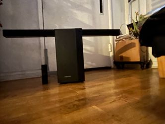 Sound bar with sound woofer, charger and remote