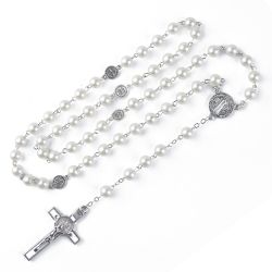 Catholic rosary beads in a gift box. White