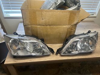 2005-2007 Toyota Avalon Headlight Set - Brand New