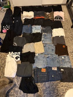 Men’s size small/ medium shirts and jean lot