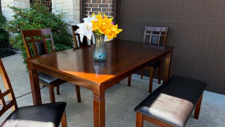 Beautiful Rectangular Table Set With 4 Matching Chairs And A Bench