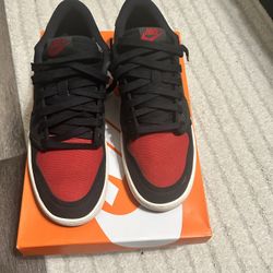 Jordan 1 Low AJKO “Bred”, Sz 10.5