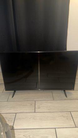 TCL Flat Screen TV with Stand