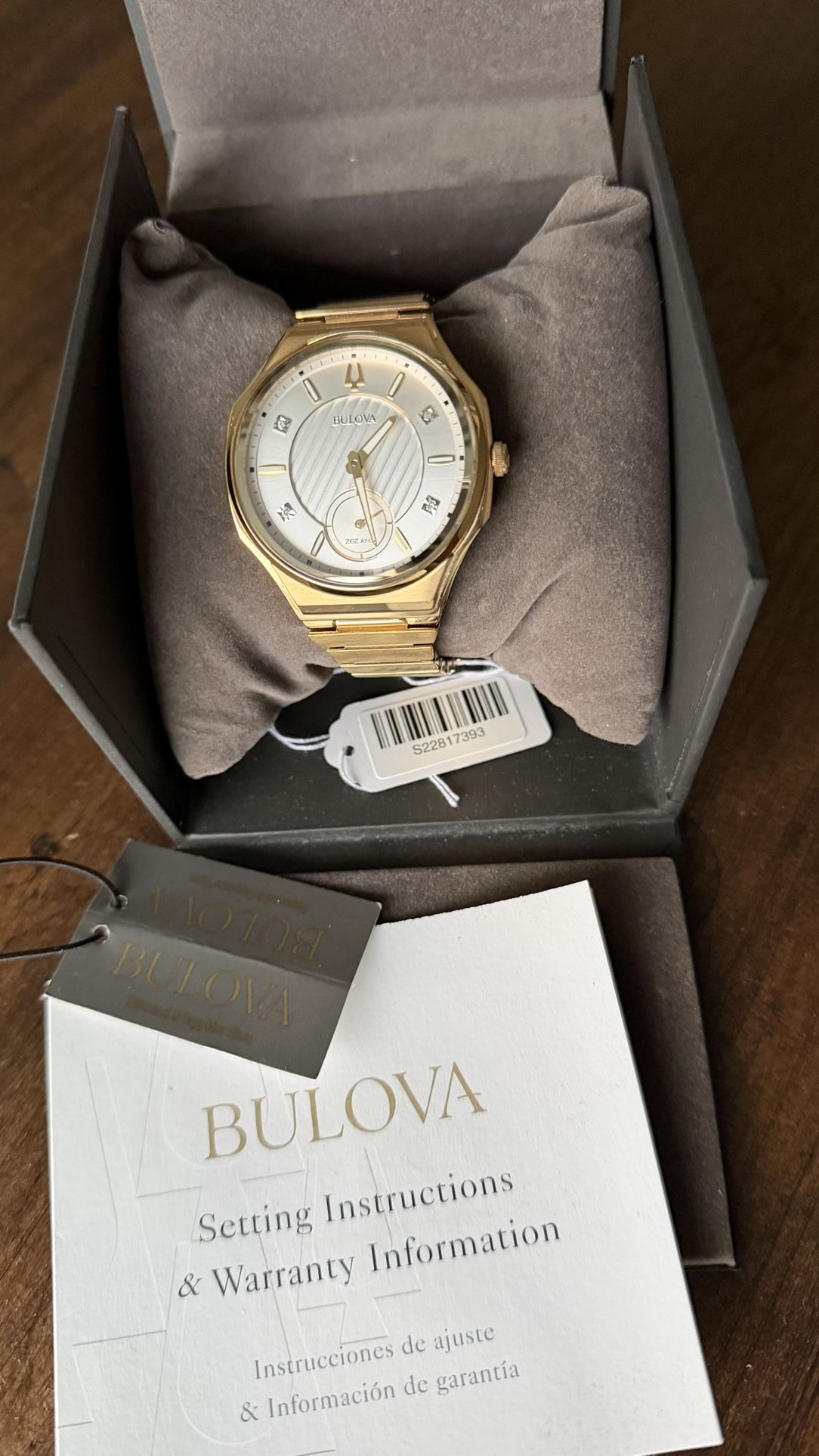 The Bulova Curv Gold PVD Steel Diamond Silver Dial Watch