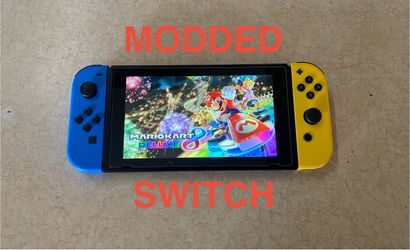 NINTENDO SWITCH V2 Loaded with 125 Popular Switch Games