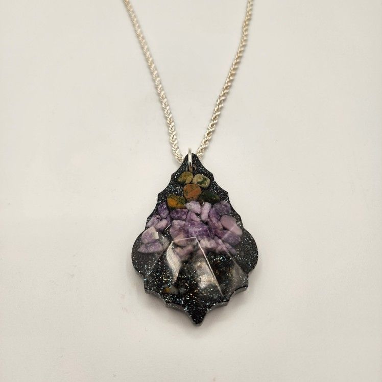 LeafAura Orgonite Pendant – EMF Protection and Energy Balancing Necklace
Weighs 2. 4 oz
Height 3 in.
Width 2 in.
Thick .3 in.
4 MM chain plat