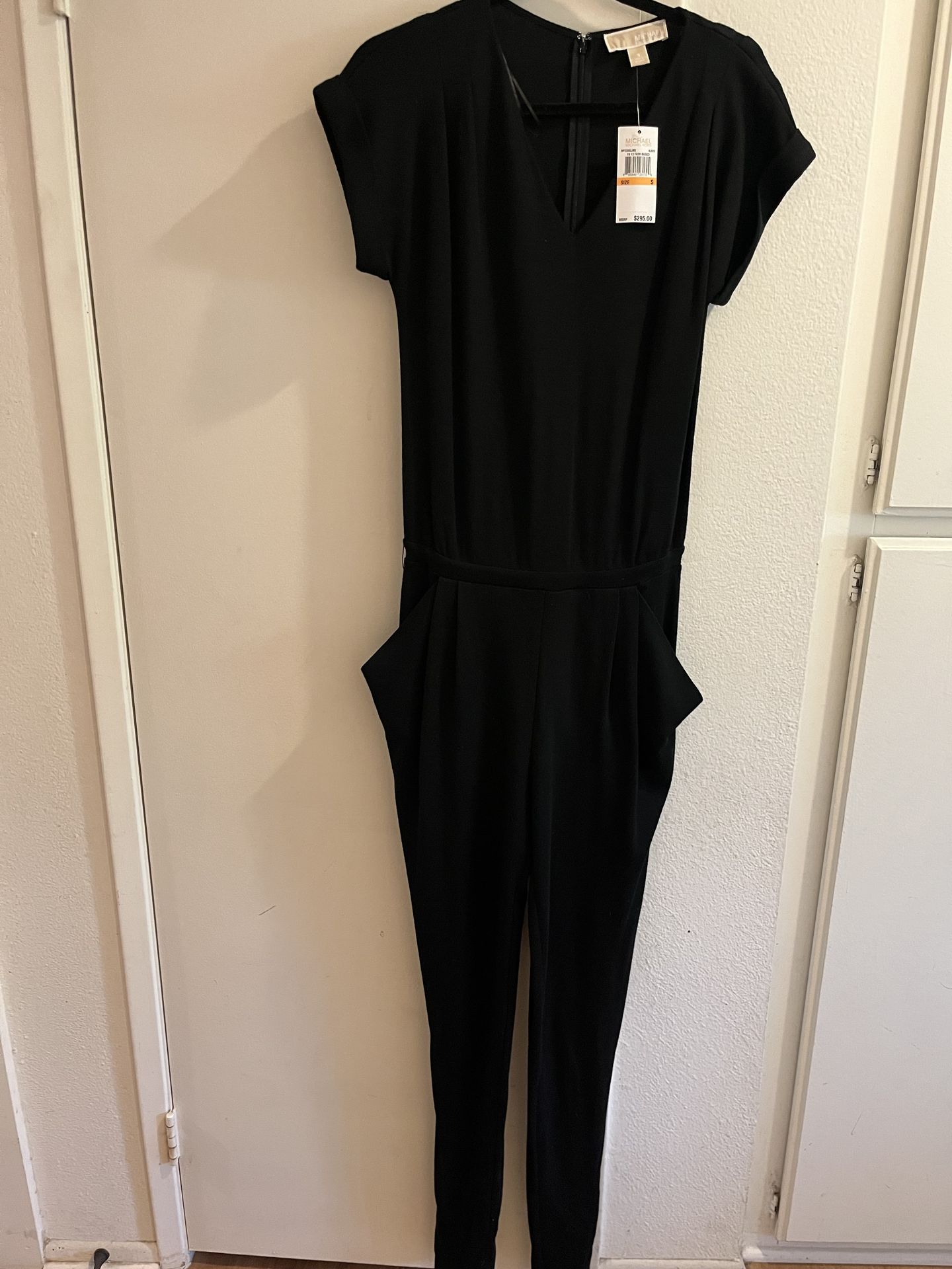 Black Michael Kors jumpsuit.