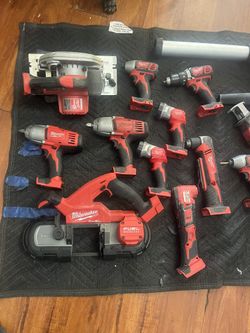Milwaukee Four Tool Set Pack Out Box With A Lot Of Batteries, Forged Batteries, And Supercharger