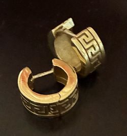 Huggie 14 k gold earrings.