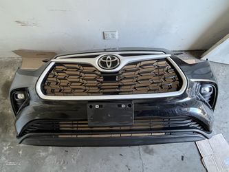 used front bumper cover with grille for a 2020-2025Toyota Highlander.