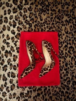 Christian Louboutin leopard print pony hair stiletto pumps