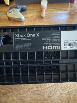 Microsoft Xbox One X Bundle with 22 Games and 40+ Blu-ray Movies