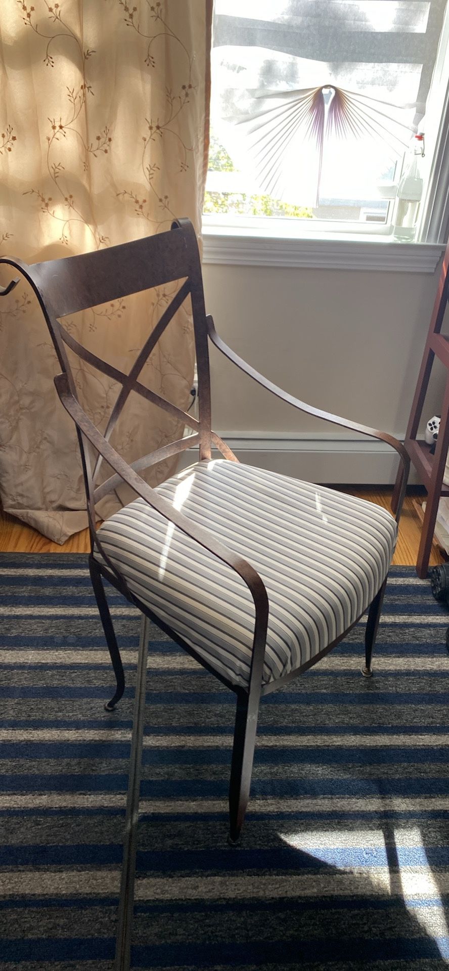 Brown Wrought iron sitting chair with cushion by Bombay company..excellent 