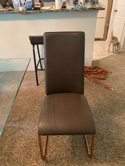 Glass dining room table with marble base