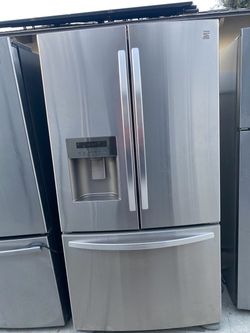 Kenmore beautiful stainless steel refrigerator looks like new French door everything works perfectly first come first served