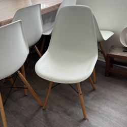 6 White Plastic Chairs  With Wood Legs