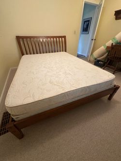 Queen sized bed and mattress