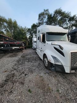 2x Volvo vnl860 22 289 k m and 23 760 287 k m