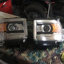 Headlights 2015 GMC Sierra SLE Original !