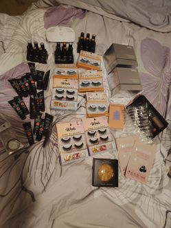 Box of poly gel nail stuff and lashes
