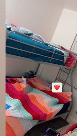 Brand new bunk bed with mattress they still have plastic on them