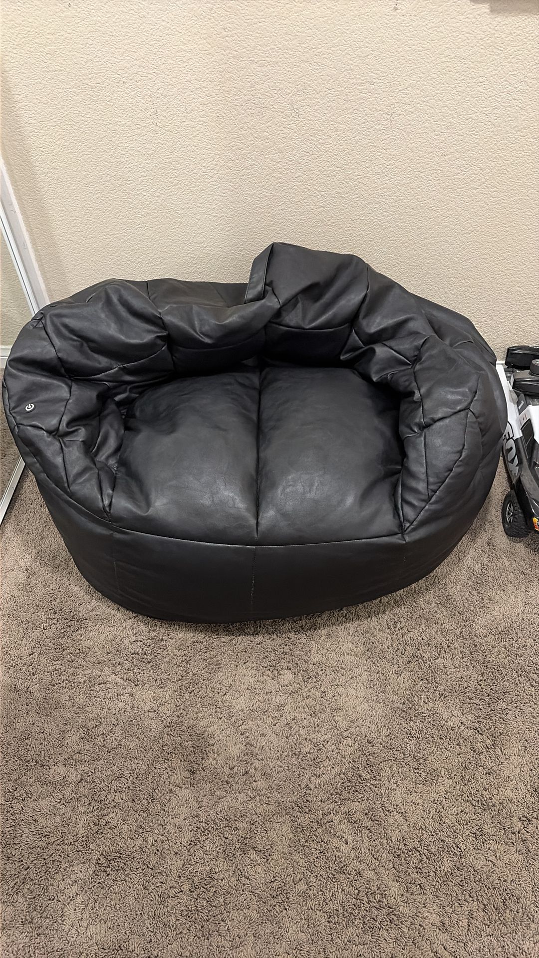 Massaging bean bag chair