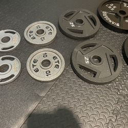 BRAND NEW Olympic  Weights Plates Set. Total weight 240#