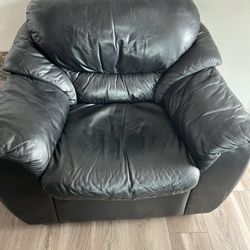 Three piece, leather sofa, armchair, and ottoman