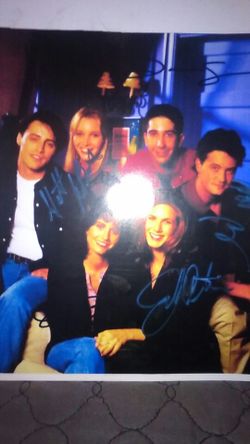 100% real autographed photo of the entire cast of friends.