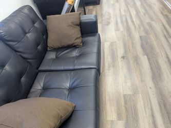 2 black sofas