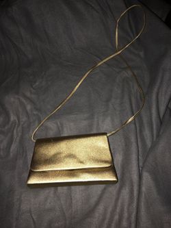 Gold small hand bag/clutch
